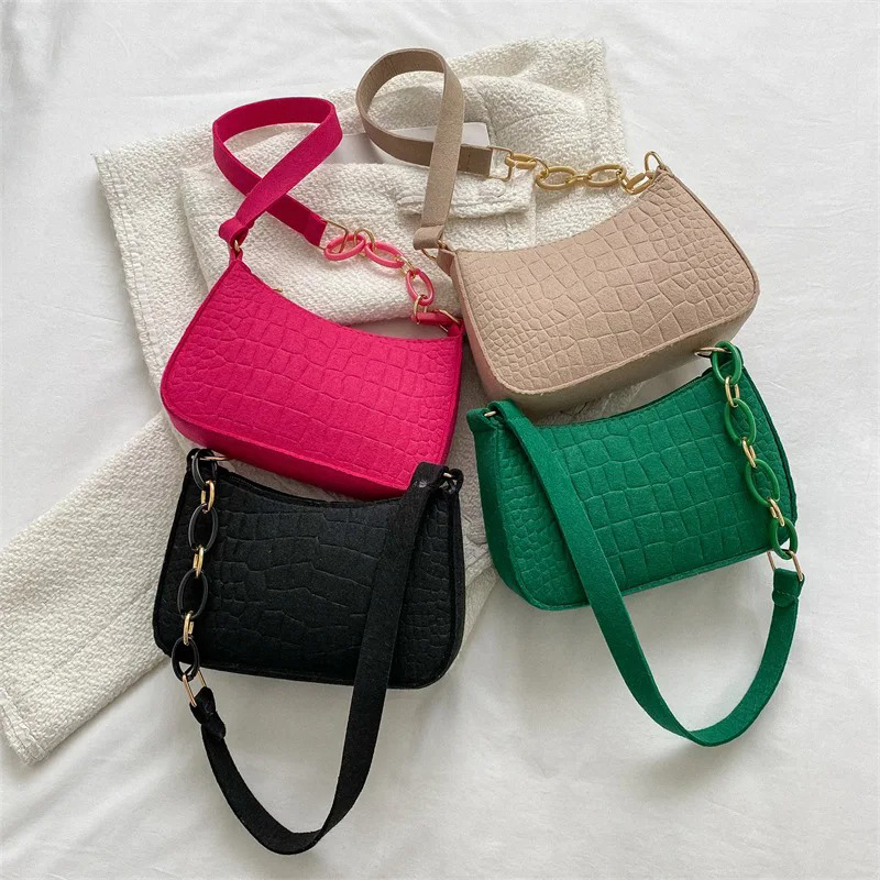 Mode dameshandtas onder de arm - Half Moon Crescent recensie en prijs
