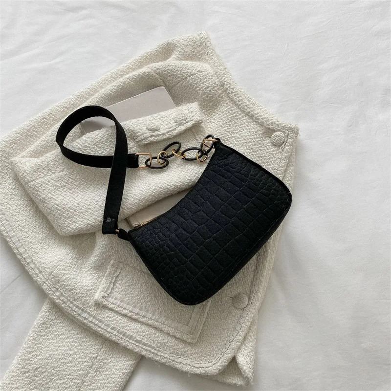 Mode dameshandtas onder de arm - Half Moon Crescent recensie en prijs